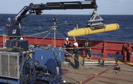 Bluefin-21 on a boat about to be launched into the ocean