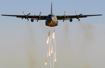 Lockheed C-130E dropping flares