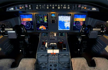 A modern glass cockpit in a C-130